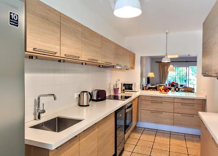 Spacious Beachfront Town House In With Fully Equipped Kitchen, Pools, Garden, Sea View Holiday home *